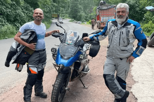 Actor Ajith riding a bike in the Himalayas